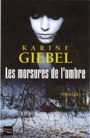  LES MORSURES DE L'OMBRE, par Karine Giebel aux éditions Fleuve Noir